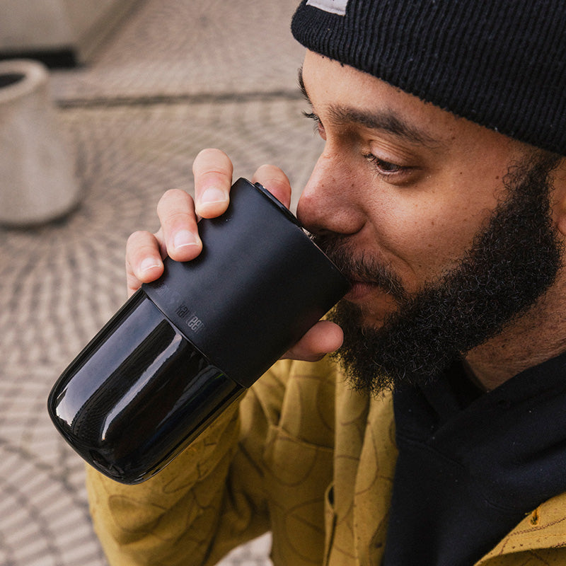 16oz-rise-tumbler-j2 16oz_rise_tumbler_black_man_drink_square.jpg