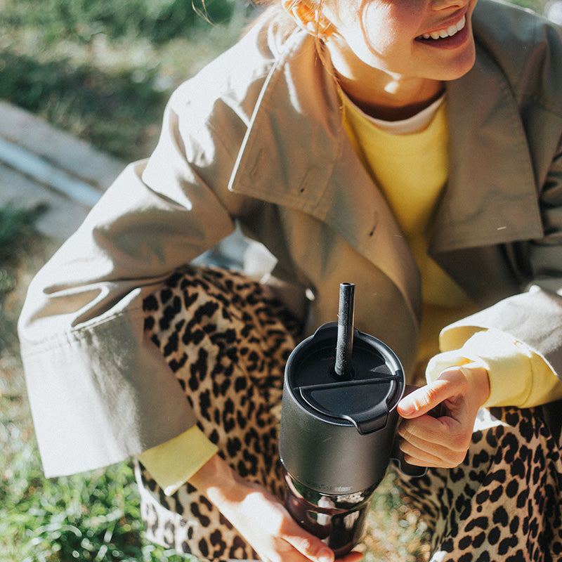 26oz-rise-tumbler-with-straw-lid-u8 26oz_rise_tumbler_black_woman_topview_square.jpg