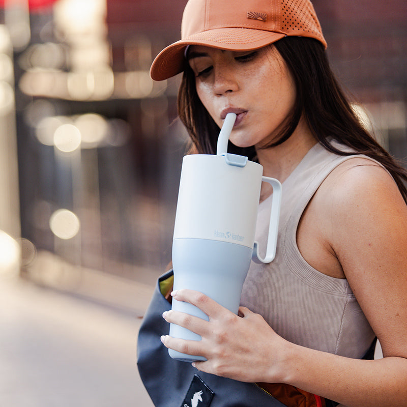 36oz-rise-tumbler-with-straw-lid-h2 36oz_rise_tumbler_straw_girl_sip_square.jpg
