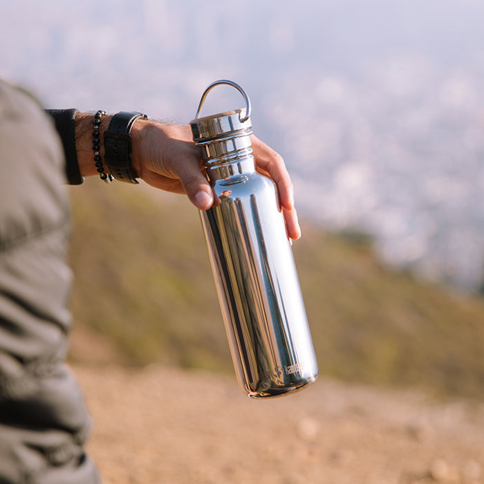 27oz-reflect-with-bamboo-cap-f1 K27SSLRF-MS-BAMBOO_reflect_bottle_hand_lifestyle.jpg