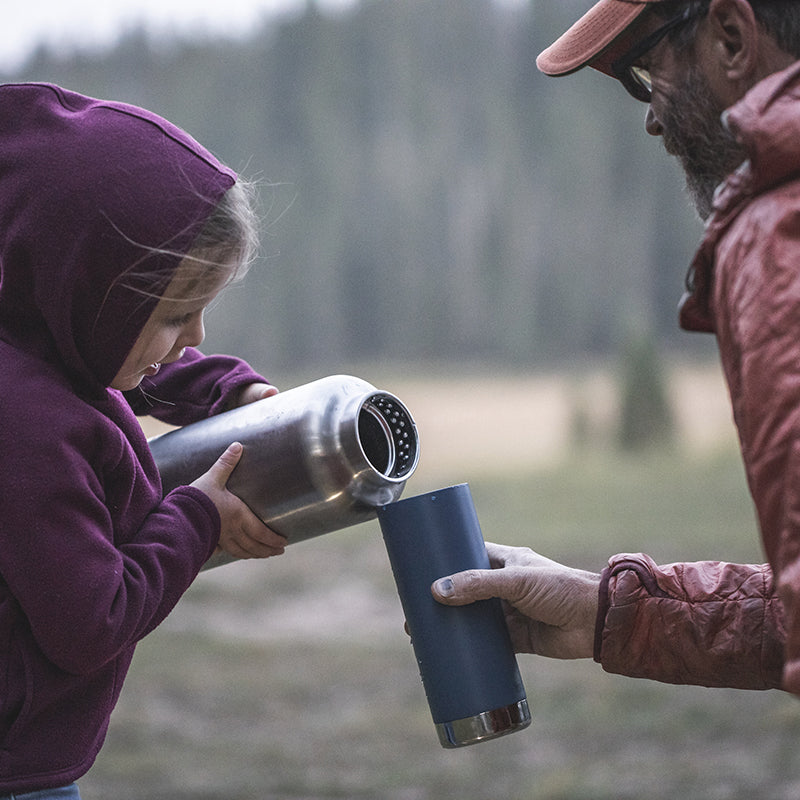64oz-tkwide-with-loop-cap-q5 tkwide_64oz_bottle_girl_dad_filling_square.jpg